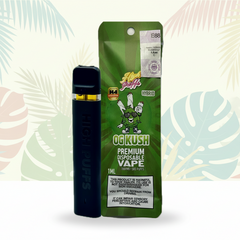 Green and black vape device with packaging labeled 'OG Kush' on a white background